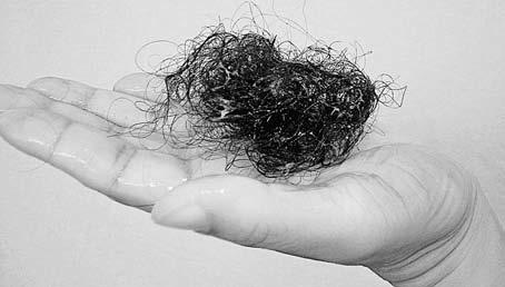 94 Curly Like Me Money-Saving Tip You can finally use up those shampoos you don t really like to clean your Denman-style brush.
