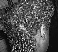 This shows the spectacular definition she got after leaving in conditioner and twisting each little curl.