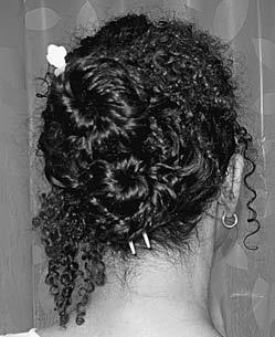 242 Curly Like Me Double Bun This is a fun style that s not only easy to do, but very secure.