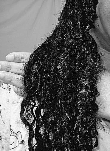 62 Curly Like Me Once the conditioner has been worked through to your hair s ends, gently squeeze it into your hair. Knead it like a bag full of frosting.