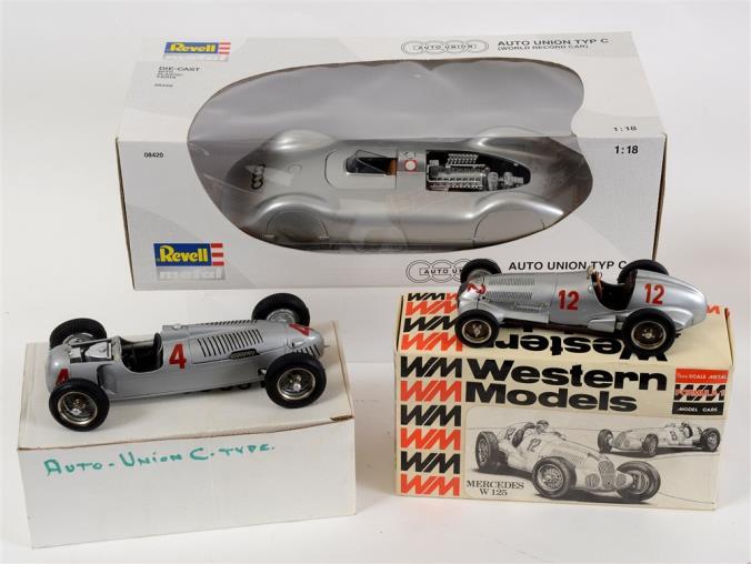 206 TWO TINPLATE WORLD LAND SPEED RECORD RACING CARS comprising a Schylling Golden Arrow, gold, with a clockwork motor, boxed; and a Schylling Sunbeam 1000H.P., crimson, with a clockwork motor, boxed.