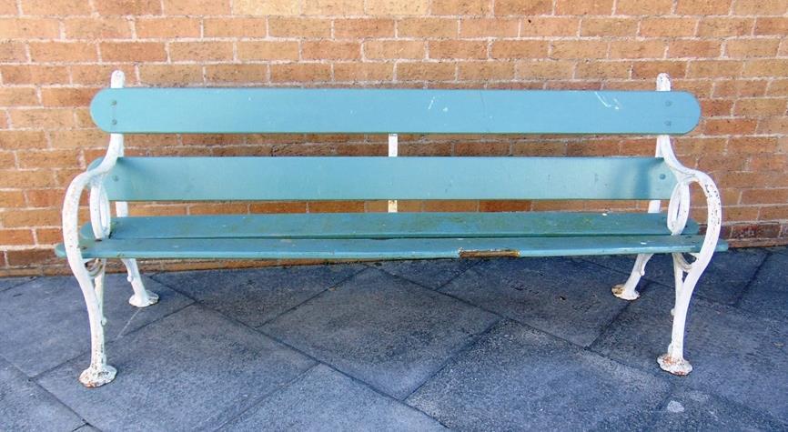 VAT) 423 A GARDEN BENCH with naturalistic cast iron end supports, 201cm wide 424 A LARGE 19TH CENTURY OVERMANTLE MIRROR 143cm wide 110cm high 419 A
