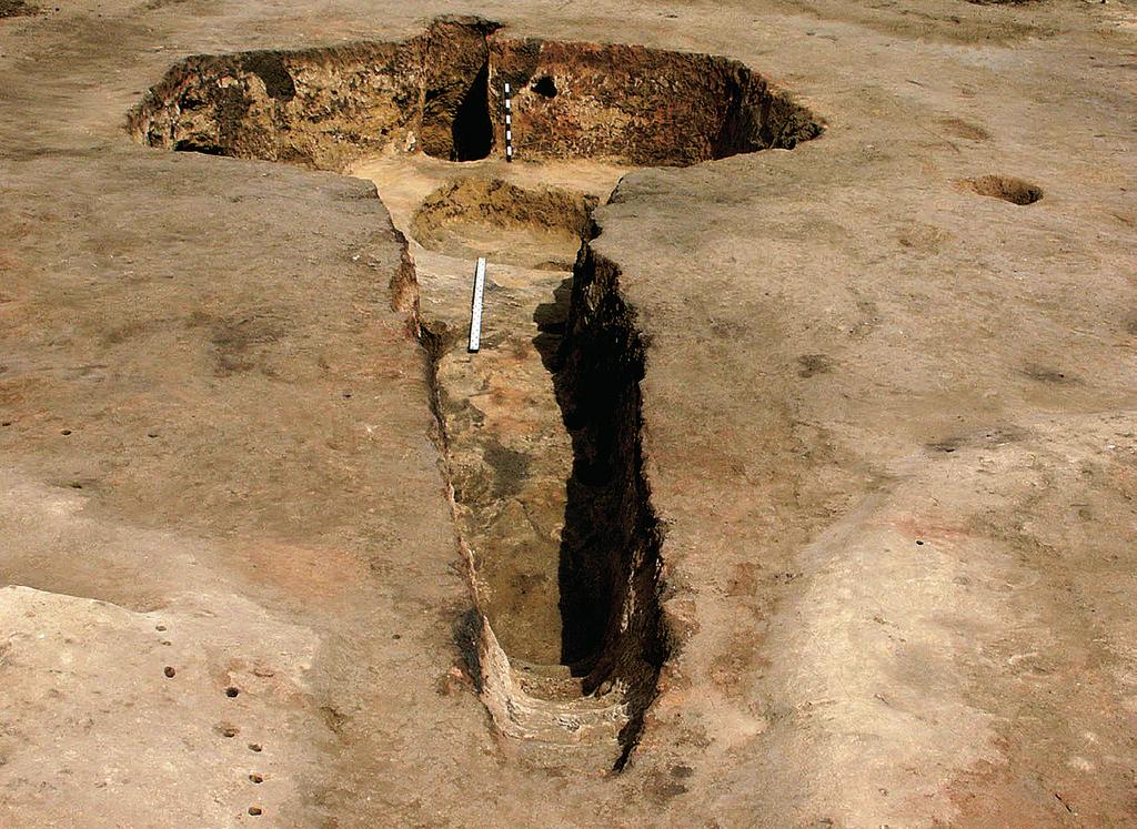 Because of this attempt to loot the burials, we backfilled the trenches and shaft later that year, but further demolition of the barrow both by natural and human factors seemed unavoidable.