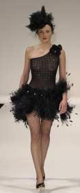 Instead of taking the obvious, salacious route, Moore attempted garments that were more tasteful and left the models, accessories and the show to provoke, with