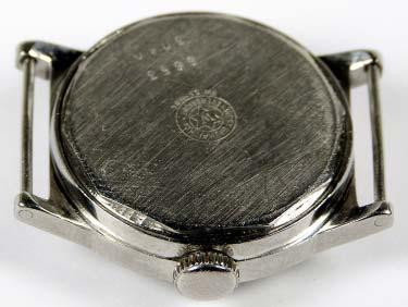 Figure 77 shows a West End Watch Co. watch with a decagonal back case supplied by Taubert.