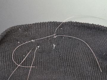 results in the thread tails being in the same place.