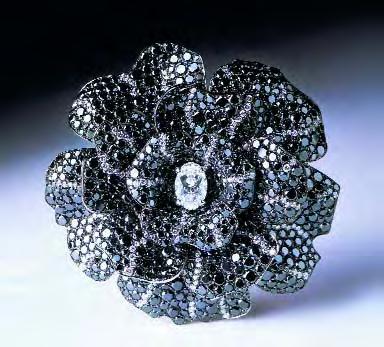 Figure 1. Black diamonds have become increasingly popular in modern jewelry such as this brooch, which contains 992 black diamonds (total weight 54.50 ct) and 170 colorless diamonds (total weight 1.