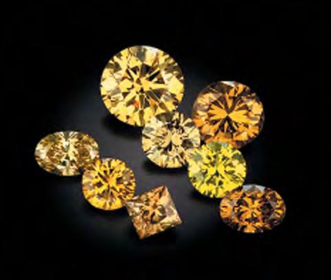 The presence of brown graining in the diamonds before treatment was likely due to nanometer-size domains of disordered (perhaps even amorphous) carbon.
