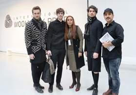 (far left) and Matthew Dainty (far right) with models.