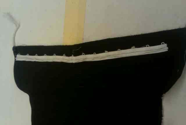 Durfee 85 Above, the eyelet tape attached where the lacing bone should be.