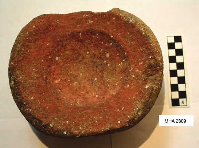 Figure 19. This half of a potter s wheel was associated with several other elements indicating the existence of a ceramic workshop that was part of the Egyptian garrison kitchen complex.