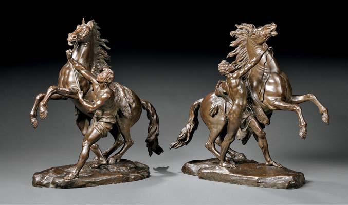 645 645 After Guillaume Coustou (French, 1677-1746) Pair of Bronze Marly Horses, late 19th/early 20th century, cast by Charles Crozatier, each with a rearing horse and struggling groom, dark brown