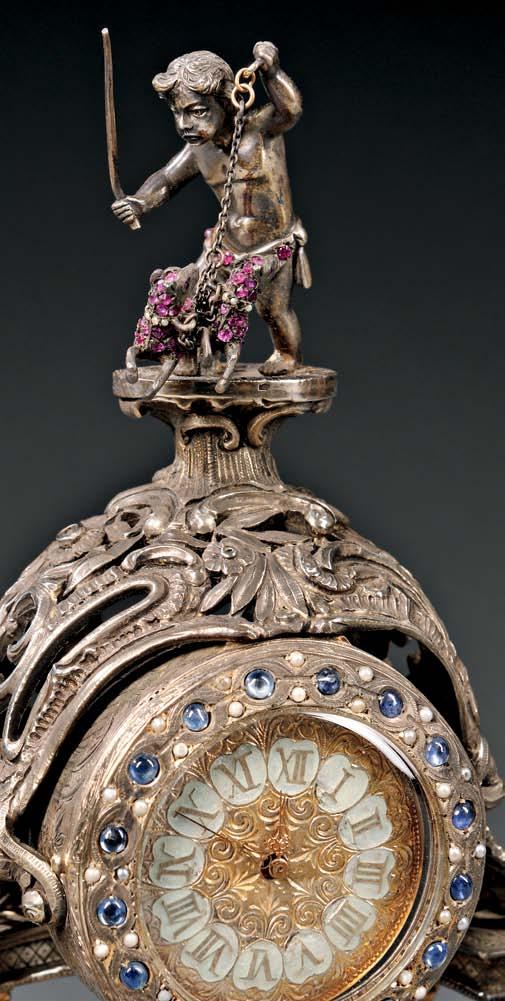 195 192 Miniature Gilt-bronze Mantel Clock, Continental, late 19th century, allover foliate decoration and with a bail handle, ht. with handle 3 1/2 in.