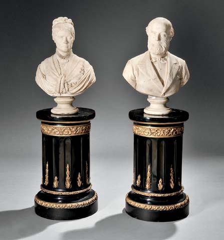 $4,000-6,000 242 Pair of Ebonized and Gilded Wood Pedestals, late 19th/early 20th century, each with circular top over fluted stem and conforming foot, with gilded collars and accents carved with