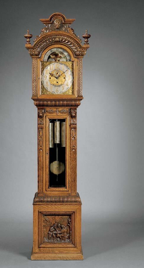 327 327 American Renaissance Revival Oak Tall Clock, retailed by H. Muhr s & Sons, Philadelphia, c.
