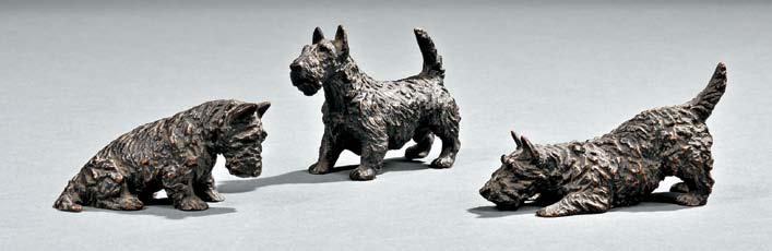 83, wd. 37 1/2 in. 397 Marguerite Kirmse (American, 1885-1954) Three Bronze Scottie Dogs: One Seated, One Crouching, One Standing, the first two stamped M.