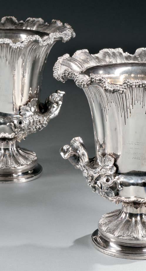 7 Three-piece George IV Sterling Silver Tea Service, London, teapot: 1828-29, Joseph Angell, maker, marks rubbed to creamer and sugar, each with a squat, gadrooned body, the teapot with a flower