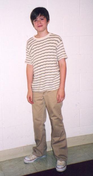 cotton v-neck shirt with tan, orange, and blue stripes * Pair of khaki corduroy pants 1970's Boy (B.