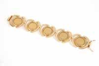 95 A gold chain with pendants, Bulgari Stamped 750, Made In Italy, ''Bvglari-Bvglari'', 18K gold chain with three interchangable pendants of