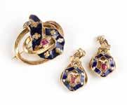 $300/500 157 A collection of antique gold and enamel jewelry A tested 14K gold, pink glass and blue enamel ribbon brooch with a pair of matching earrings that were later