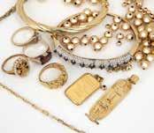 259 A group of antique jewelry Of various golds: four stone rings, two brooches, one pendant on gold-filled chain and a gold-filled pair of opera glasses