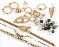 264 A large group of gold jewelry 14K gold, three rings and numerous necklace and