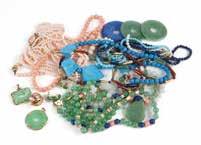 A large group of bead and costume jewelry Including ten bead necklaces, three ''Bis'', two jade and gold pendants and two pairs