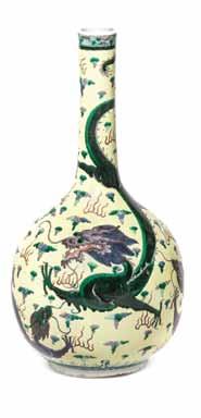 6* A Polychrome Enamel Porcelain Bottle Vase, of hexagonally faceted form, the slightly flaring neck with five horizontal ribs, dividing the neck into reserves depicting Daoist and Buddhist emblems,