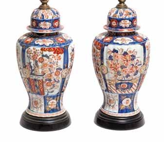 Diameter 19 inches. $600-800 350 347* A Japanese Blue and White Decorated Charger, depicting a vase with flowering branch and a butterfly. Diameter 16 inches.