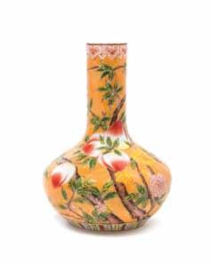 $300-500 35* A Three Color Peking Glass Vase, of baluster form, the mouth rim showing the green, white and red layers, with stiff plantain leaf and scrolled vine band decoration above the dragon