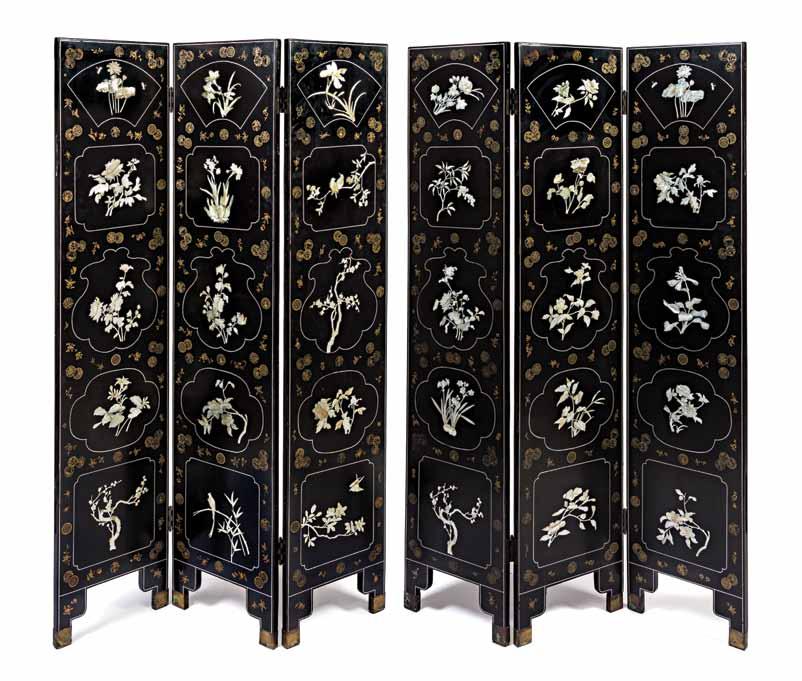111 111* A Pair of Chinese Black Lacquered Four-Panel Folding Screens, having mother-of-pearl inlaid foliate