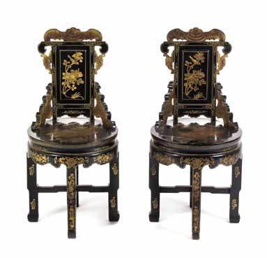 $100-200 134* A Pair of Chinese Carved Wood Side Chairs, having relief carved shou medallion to the vertical back splat, together