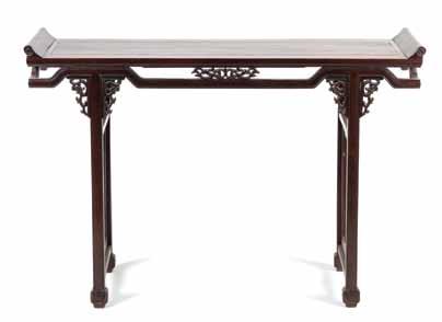 $300-500 148* A Chinese Jichimu Low Table, having a squared, recessed top, above geometric scrolled chilong at the aprons, having a single sliding drawer conforming to the top.