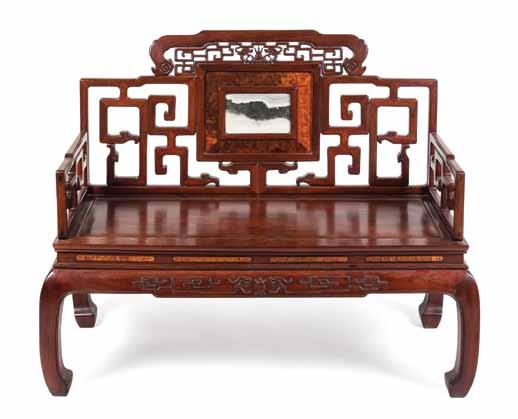 $700-900 159 detail 156* A Chinese Carved Hardwood Bench, having a double dragon pierce carved crest above the dreamstone inset back, the rectangular plank seat above a burled panel