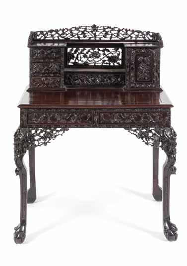 160 158 159* A Chinese Export Mother-of-Pearl Inlaid Wood and Bronze Console Table, the rectangular plank top depicting an imperial boar hunt, having scrolled accents to the corners, above a metal