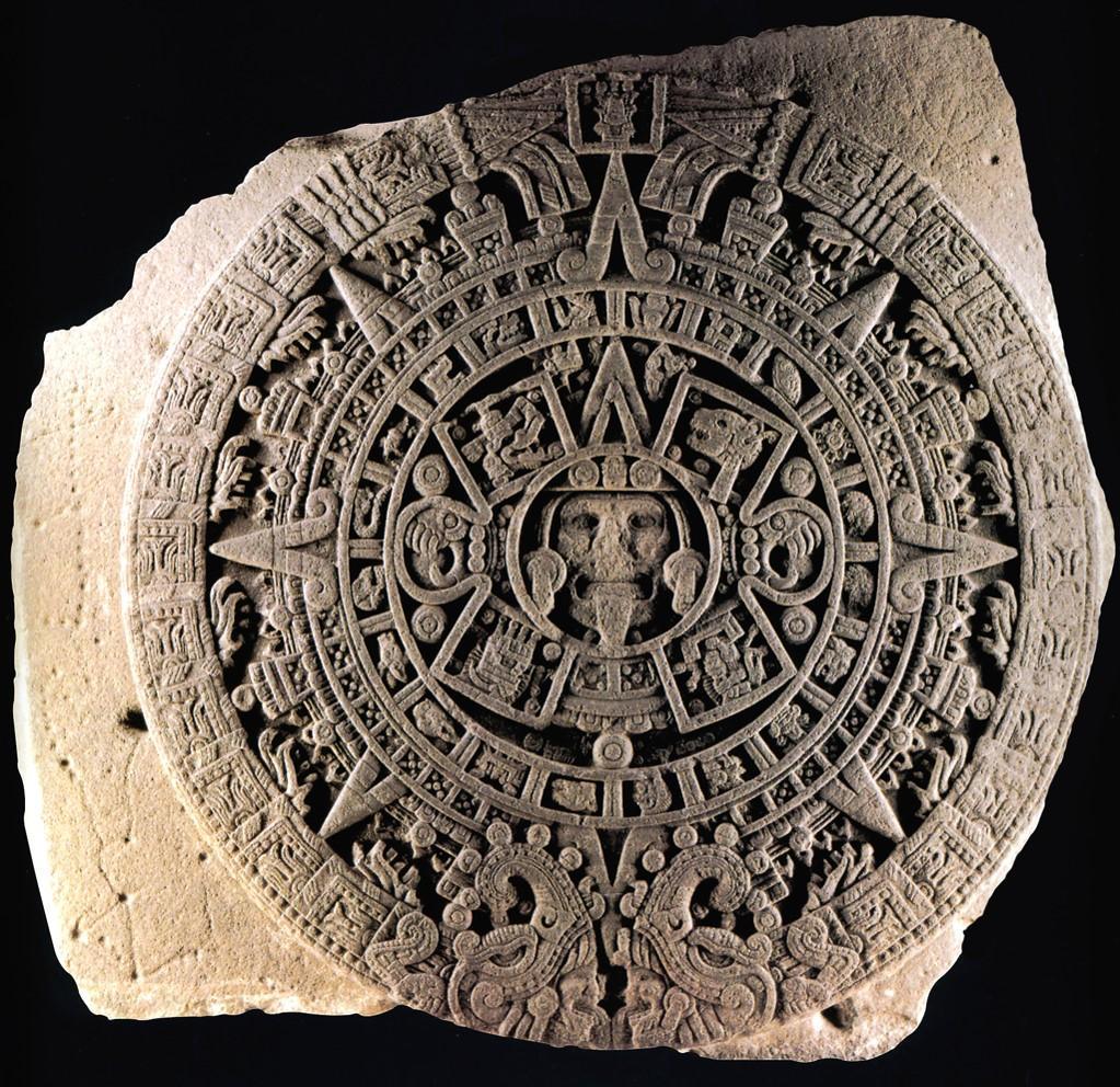 Calendar Stone (continued) Content: Depiction of five consecutive worlds in Aztec mythology Central face depicting either the Tonatiuh, Yohualtonatiuh or Tlalecuhtli Two jaguar paws