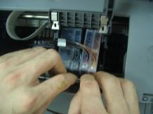 3) 3rd step: Place the CISS cartridge Take off the cover from the CISS cartridge, and then install