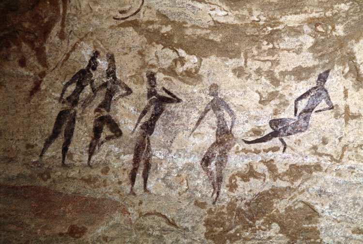 Painted rock art depicting five red figures, from Jabbaren,