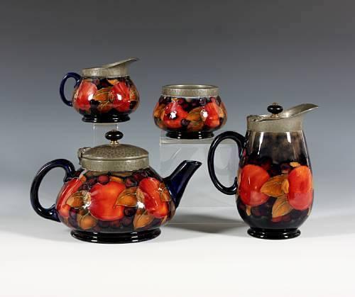 Pewter lidded and rimmed tea set in pomegranate pattern Marks painted in Blue sold at Bonhams Knowle November 4 th 2010 So likely made after 1920 (sold for Ñ1260 incl buyers premium) (Not thought to