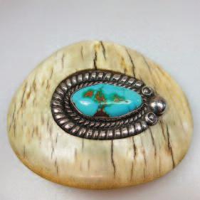 81 NAVAJO BONE AND SILVER BUCKLE set with a turquoise