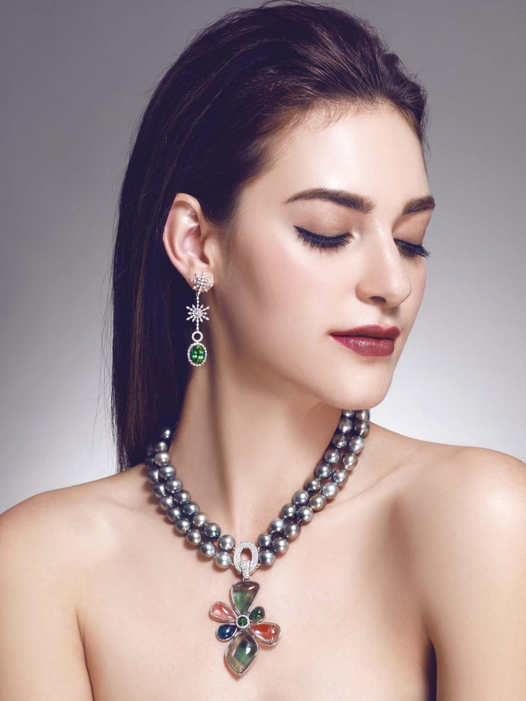 SHOWCASE Necklace: Tahitian pearl strand with an 18-karat white gold diamond clasp Pendant: Green and