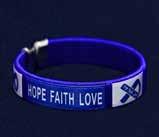 A flexible bangle bracelet that has the words Hope Faith Love with dark blue ribbons. Adult: (B-22-8H) Size: 7 1/2 in.