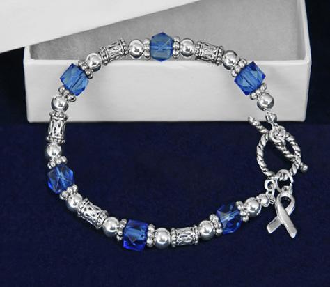 Dark blue stretch band with a sterling silver plated charm that has a dark blue ribbon.