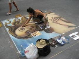 Today, more than 200 of these artists spend hours turning Larimer Square into a museum of chalk art over the course of three days.