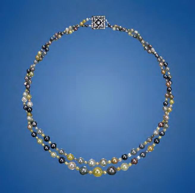 Figure 5. This double-strand necklace of graduated diamond pearls was sent to the East Coast lab for determination of color origin. The beads ranged from approximately 1.75 to 10.00 mm.