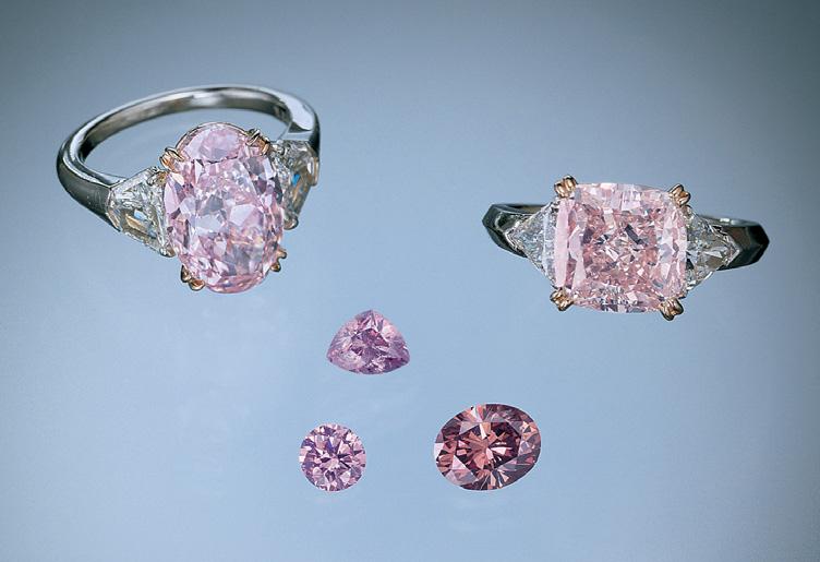 54 ct) are Fancy Intense purplish pink, and the 1.12 ct oval is Fancy Deep orangy pink. The rings are courtesy of Rima Investors Corp.