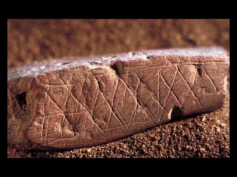 Engraved ochre. c.75,000 BCE. Length 4".