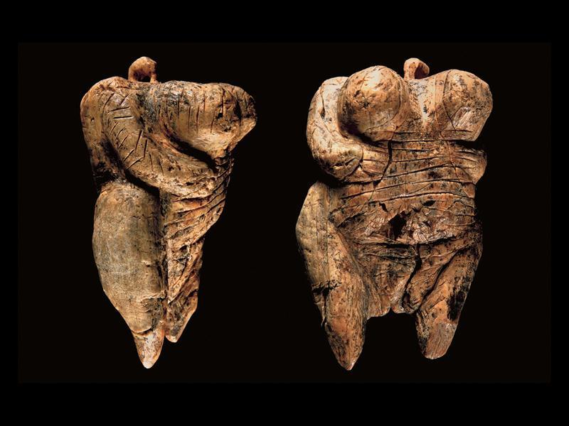 Hohle Fels figure, front and side views. c. 35,000 BCE. Carved mammoth tusk.
