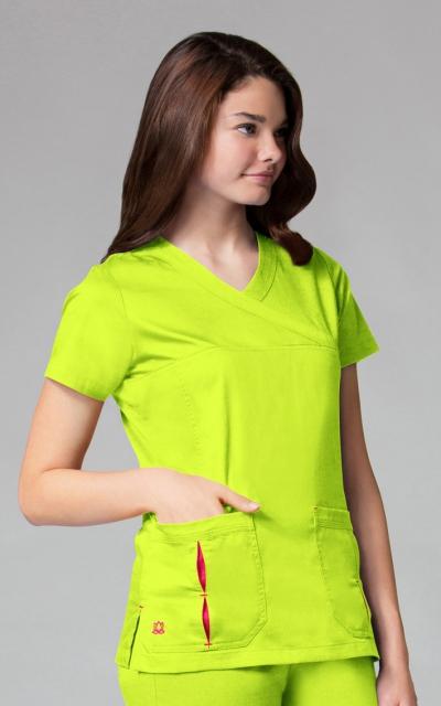 52% Cotton 35% Polyester 13% Elasterell-P Ladies Inner Beauty Top M1722 $26.99 Embroidered Front and back darts, two lower patch pockets, loop pen pocket.