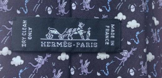 The text on the left reads "DRY CLEAN ONLY" and on the right reads "MADE IN FRANCE" and on the bottom "HERMESPARIS." 11.